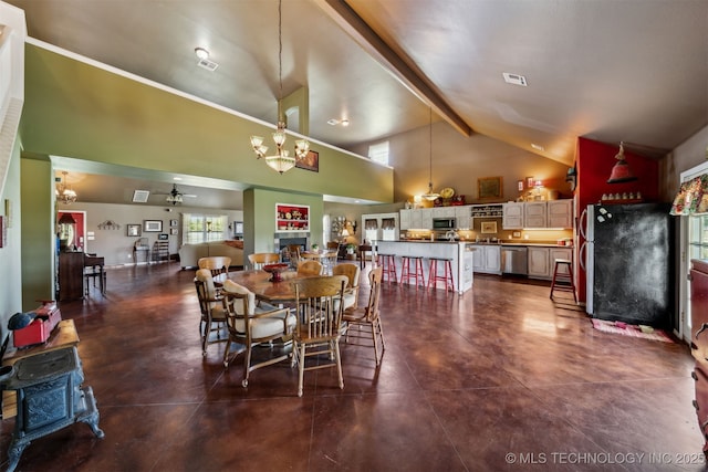 dining area with beam ceiling, ceiling fan with notable chandelier, and high vaulted ceiling