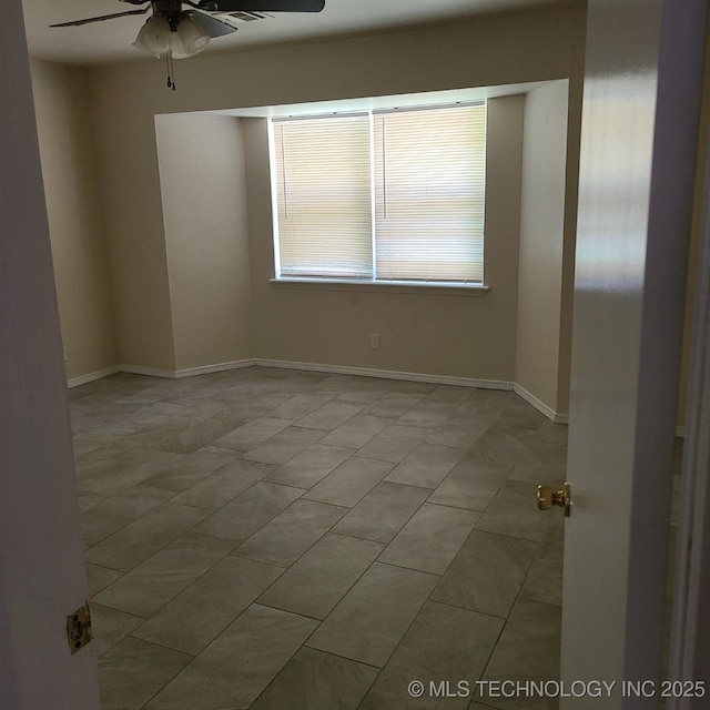 empty room with ceiling fan