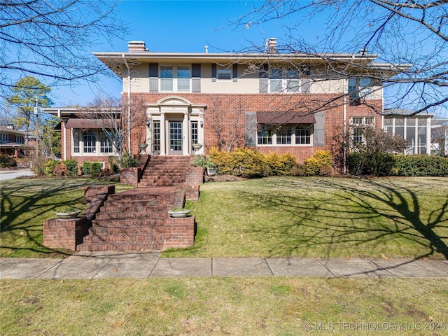 view of front of house with a front lawn