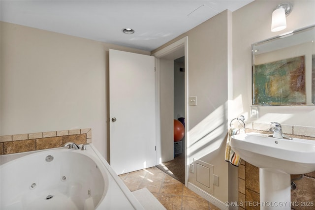 bathroom featuring sink and a bathtub