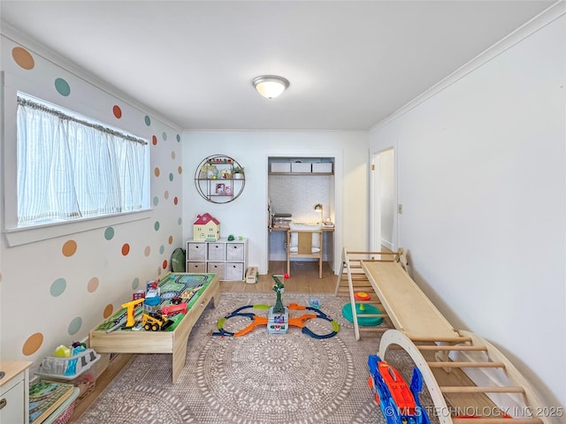 game room with ornamental molding