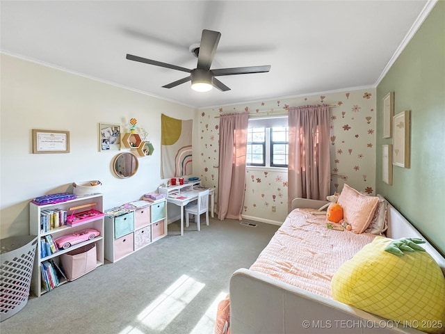 bedroom featuring crown molding, carpet floors, and ceiling fan