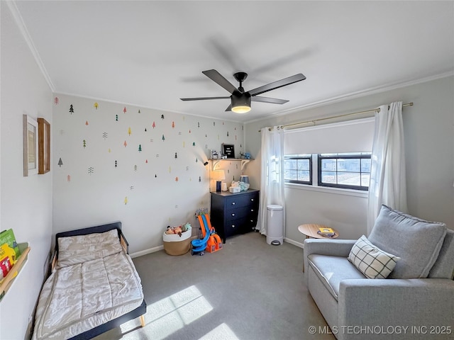 carpeted bedroom with crown molding and ceiling fan