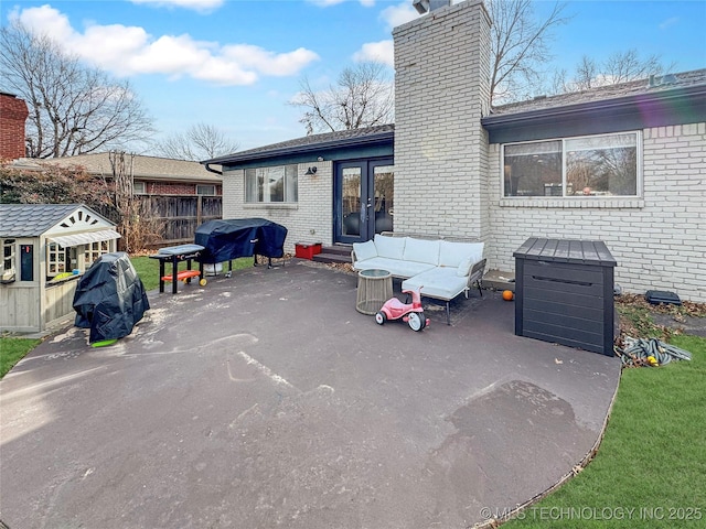 back of house featuring a patio area