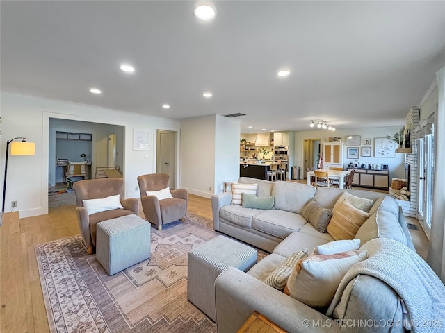 living room featuring light wood-type flooring