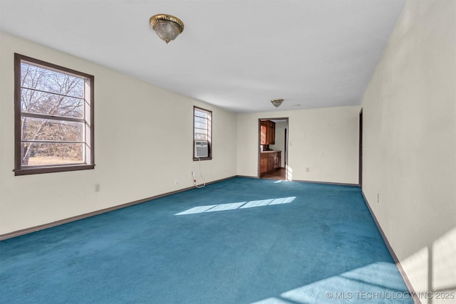 empty room with cooling unit and carpet floors