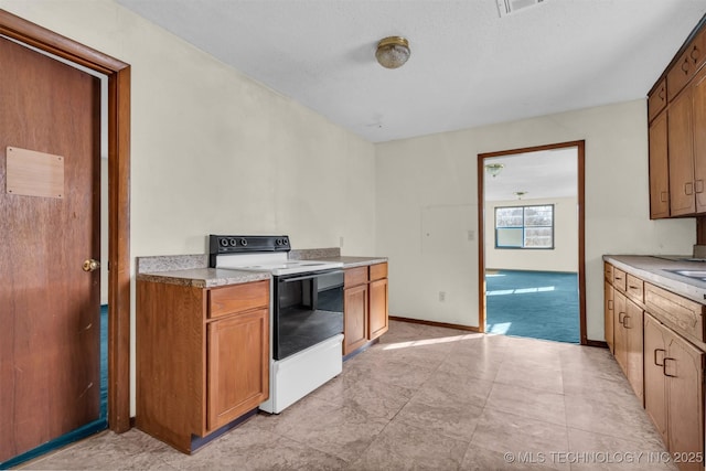 kitchen with electric range oven