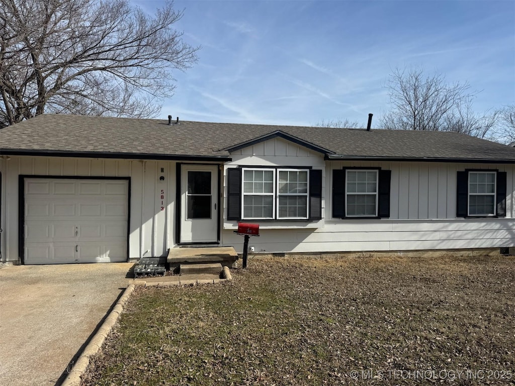 single story home with a garage