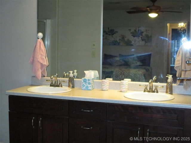 bathroom featuring ceiling fan and vanity