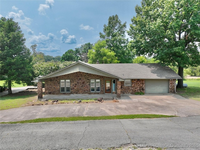 single story home featuring a garage