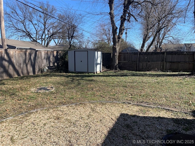 view of yard featuring a storage unit