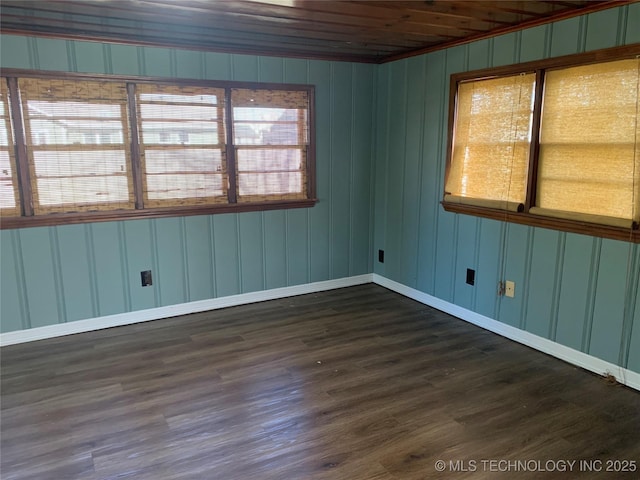 empty room with dark wood-type flooring