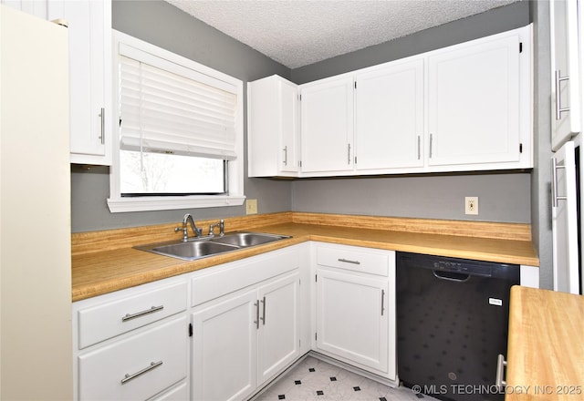 kitchen with white cabinets, a textured ceiling, sink, and dishwasher