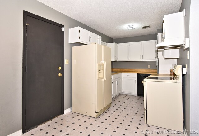 kitchen with white cabinetry, a textured ceiling, and white appliances