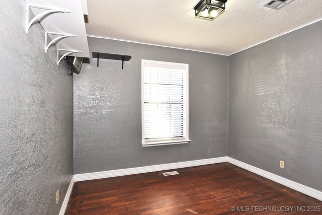 foyer entrance featuring a textured ceiling