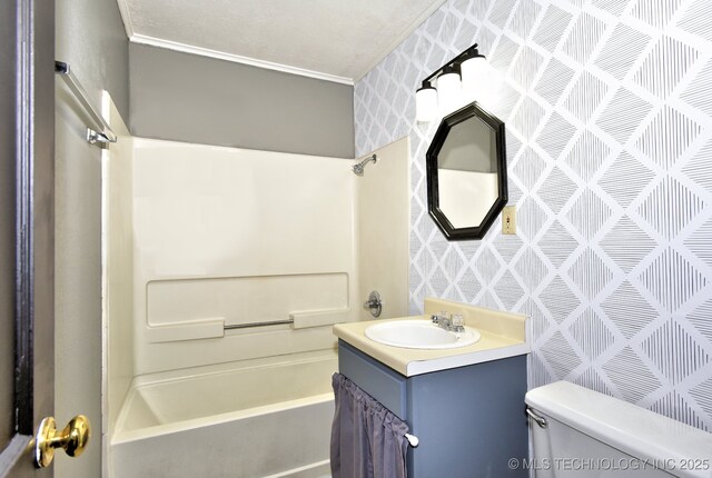 full bathroom featuring vanity,  shower combination, and toilet