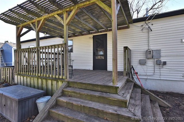 wooden deck with a pergola