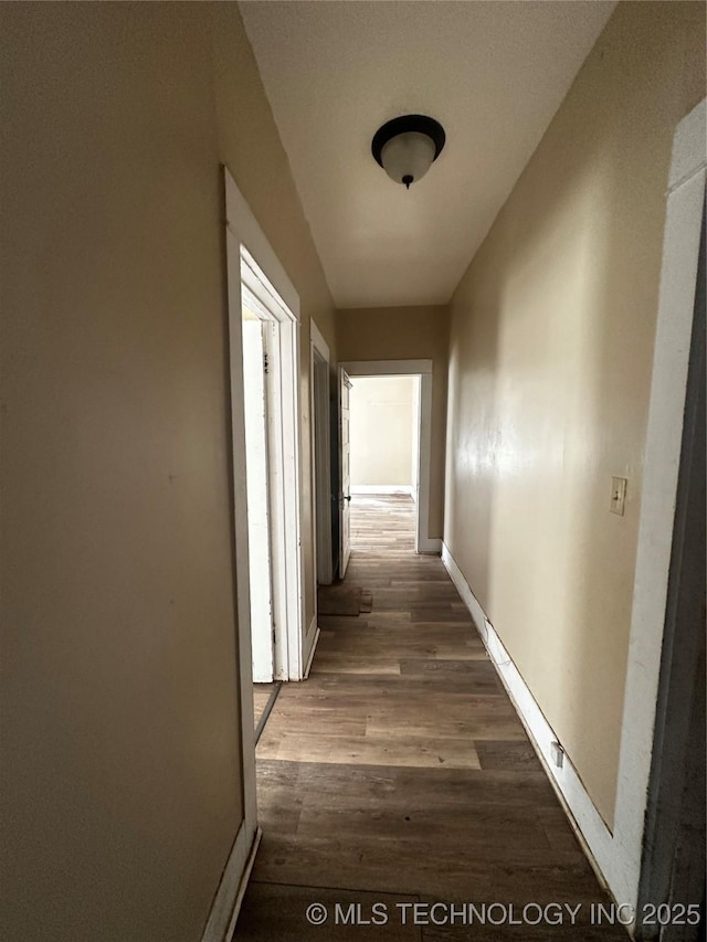 hall featuring dark hardwood / wood-style floors