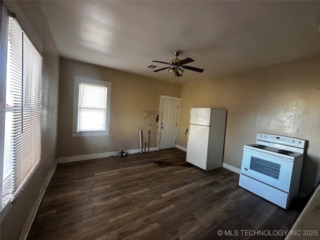 kitchen with white appliances, dark wood-type flooring, and ceiling fan