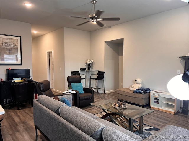 living area featuring recessed lighting, baseboards, ceiling fan, and wood finished floors