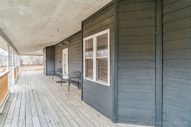 deck featuring covered porch