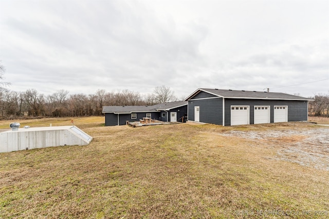 view of yard with a garage