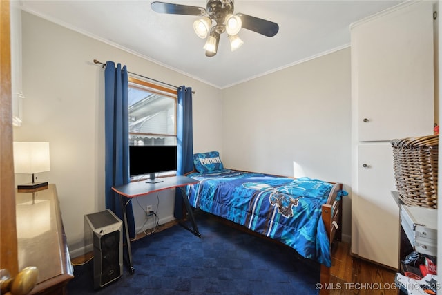 bedroom with dark hardwood / wood-style flooring, ornamental molding, and ceiling fan