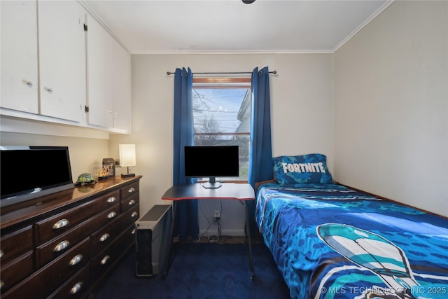 bedroom with dark colored carpet and crown molding