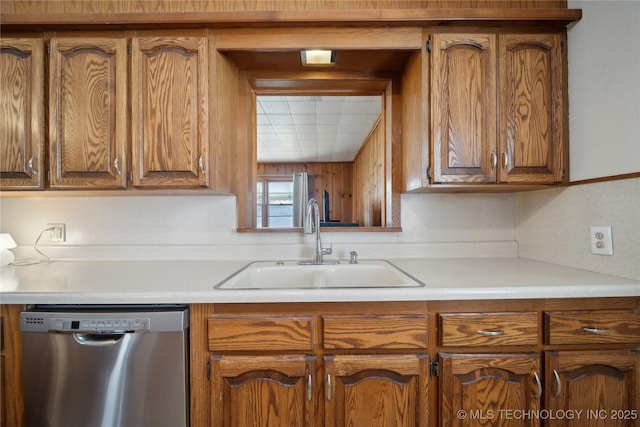 kitchen with sink and stainless steel dishwasher