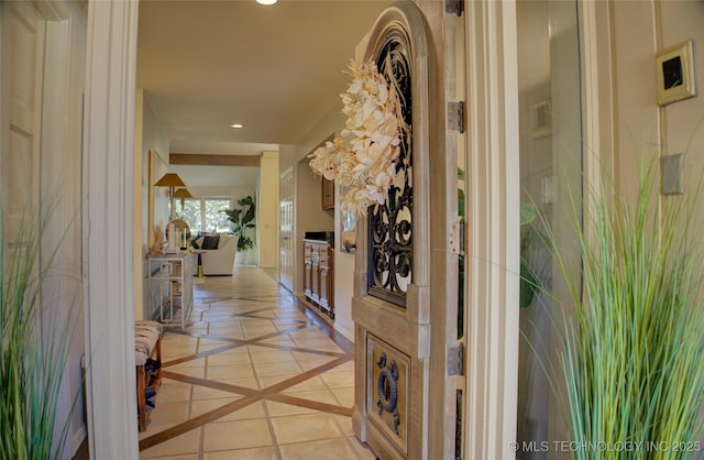 hallway with light tile patterned floors