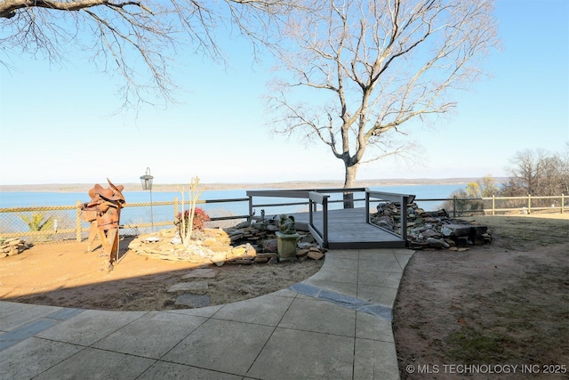 dock area with a water view