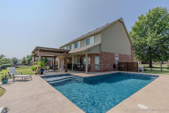 view of swimming pool featuring a pergola and a patio area