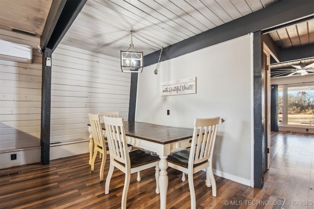 dining space with an inviting chandelier, a wall mounted air conditioner, dark hardwood / wood-style floors, and beamed ceiling