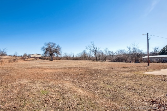 view of yard featuring a rural view