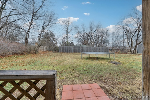 view of yard featuring a trampoline