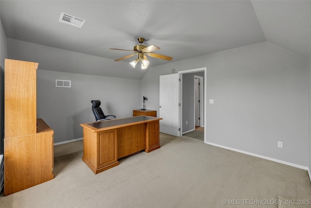home office featuring lofted ceiling, light carpet, and ceiling fan