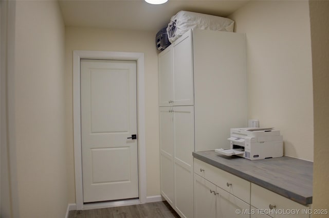 washroom with light hardwood / wood-style floors