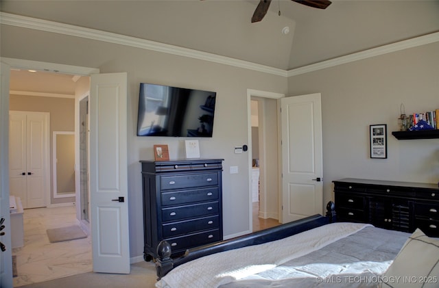 bedroom with lofted ceiling, crown molding, and ceiling fan