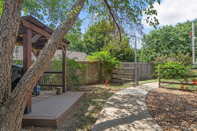 view of yard with a deck