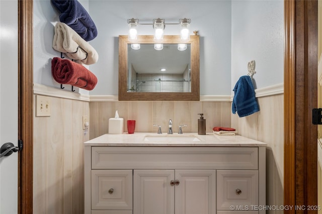 bathroom with vanity and walk in shower