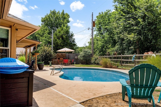 view of pool with a patio area