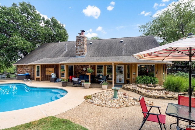 view of pool with a patio area