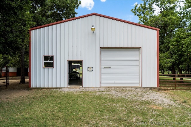 garage with a yard