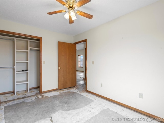 unfurnished bedroom with ceiling fan, a closet, and a textured ceiling