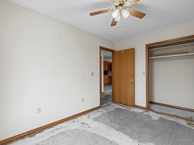 unfurnished bedroom with a textured ceiling, a closet, and ceiling fan