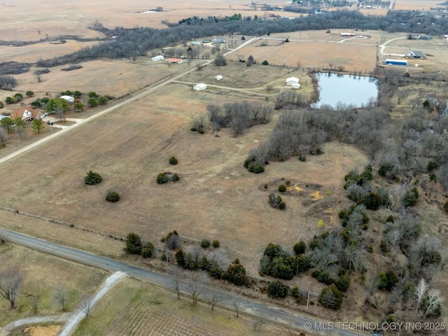 bird's eye view featuring a water view and a rural view