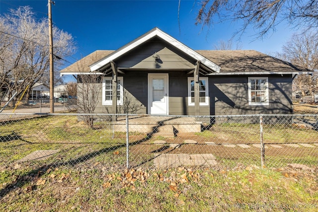 ranch-style home with a front yard