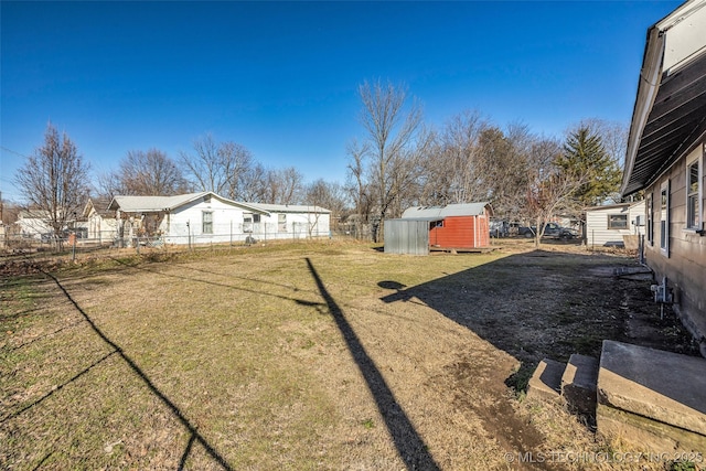 view of yard featuring a storage shed