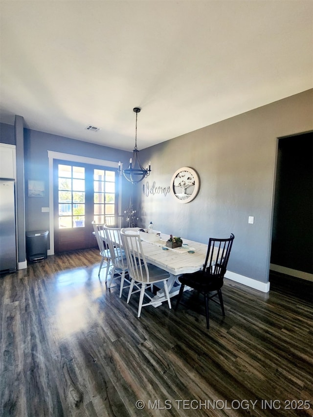 dining room featuring dark hardwood / wood-style floors