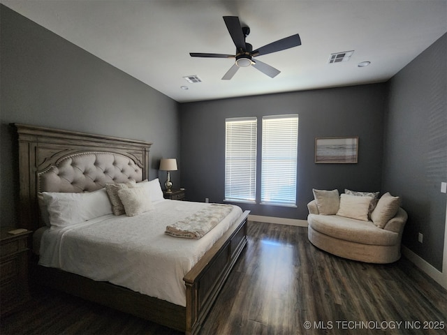 bedroom with dark wood-type flooring and ceiling fan